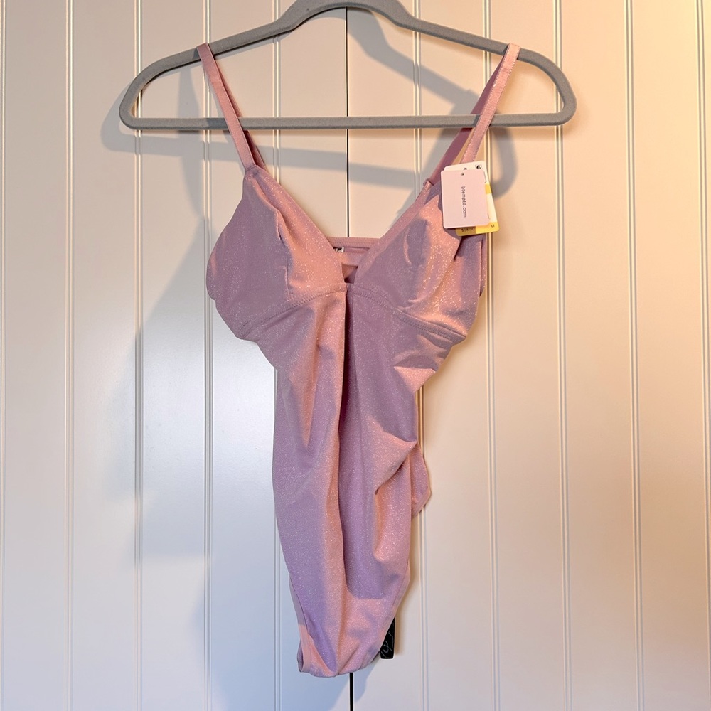 Gorgeous one piece bodysuit, size M. New, have a little sparkle